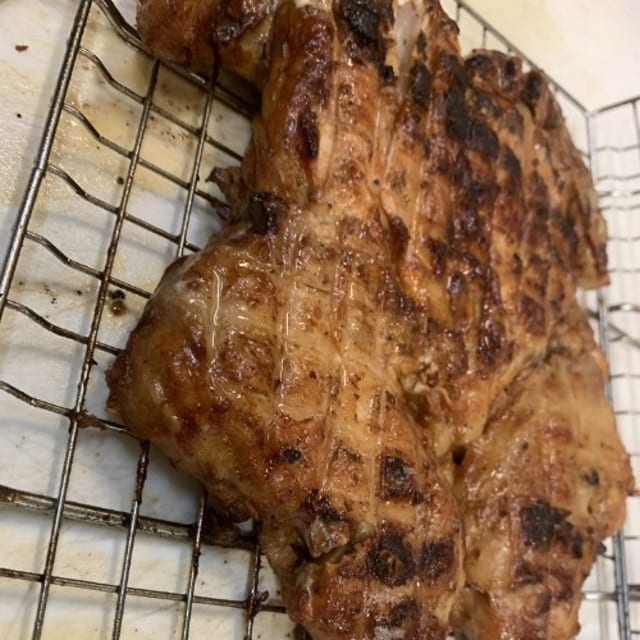 WHOLE CHICKEN GRILLED ON CHARCOAL.